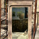 Imposing fireplace mirror in carved and painted wood, 19th century.