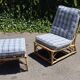 Rattan armchair and its footrest by Audoux & Minet 1950