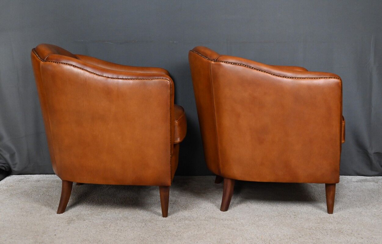 Pair of Solange club armchairs in sheepskin leather – reproduction