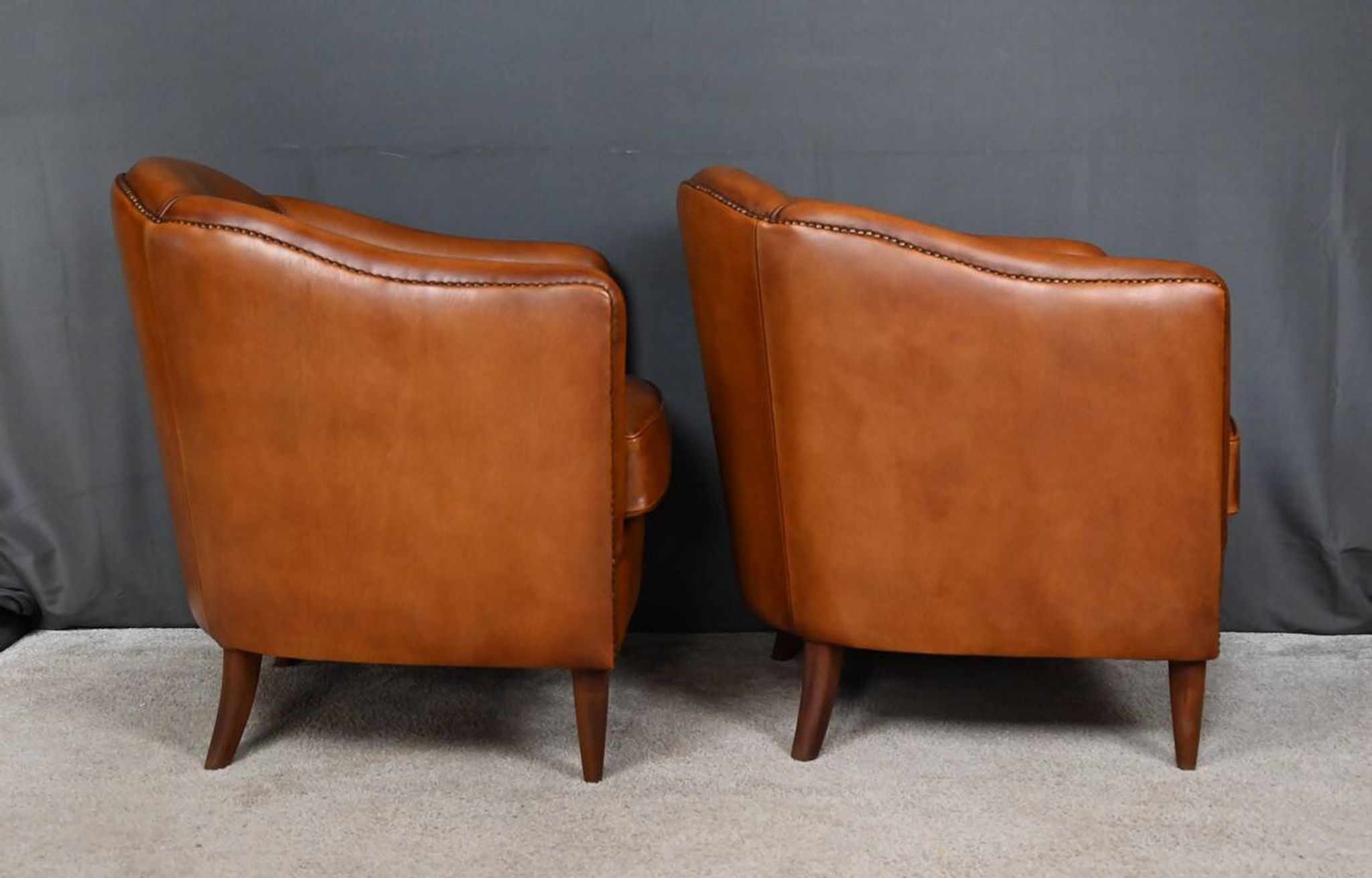 Pair of Solange club armchairs in sheepskin leather – reproduction