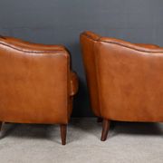 Pair of Solange club armchairs in sheepskin leather – reproduction