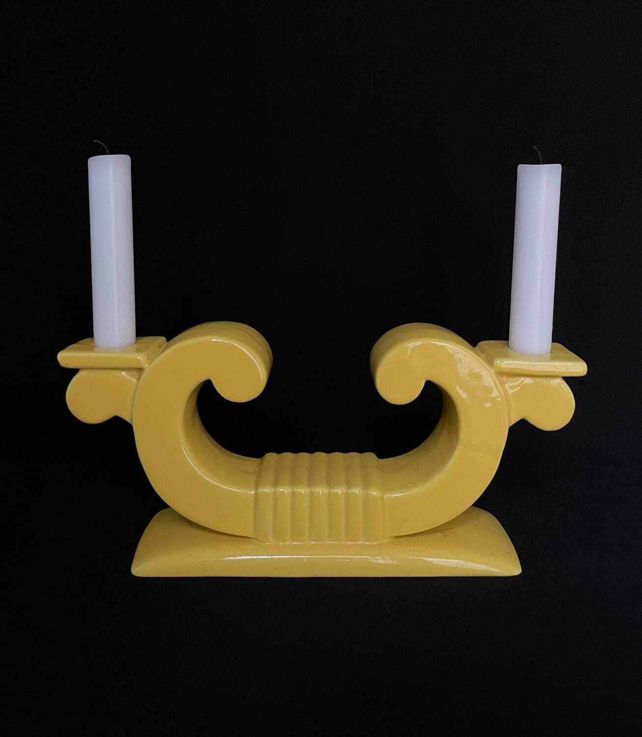 Pair of Saint Clement candlesticks