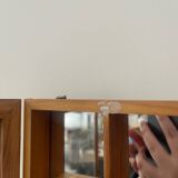 Storage box with wall-mounted glass mirror with integrated storage
