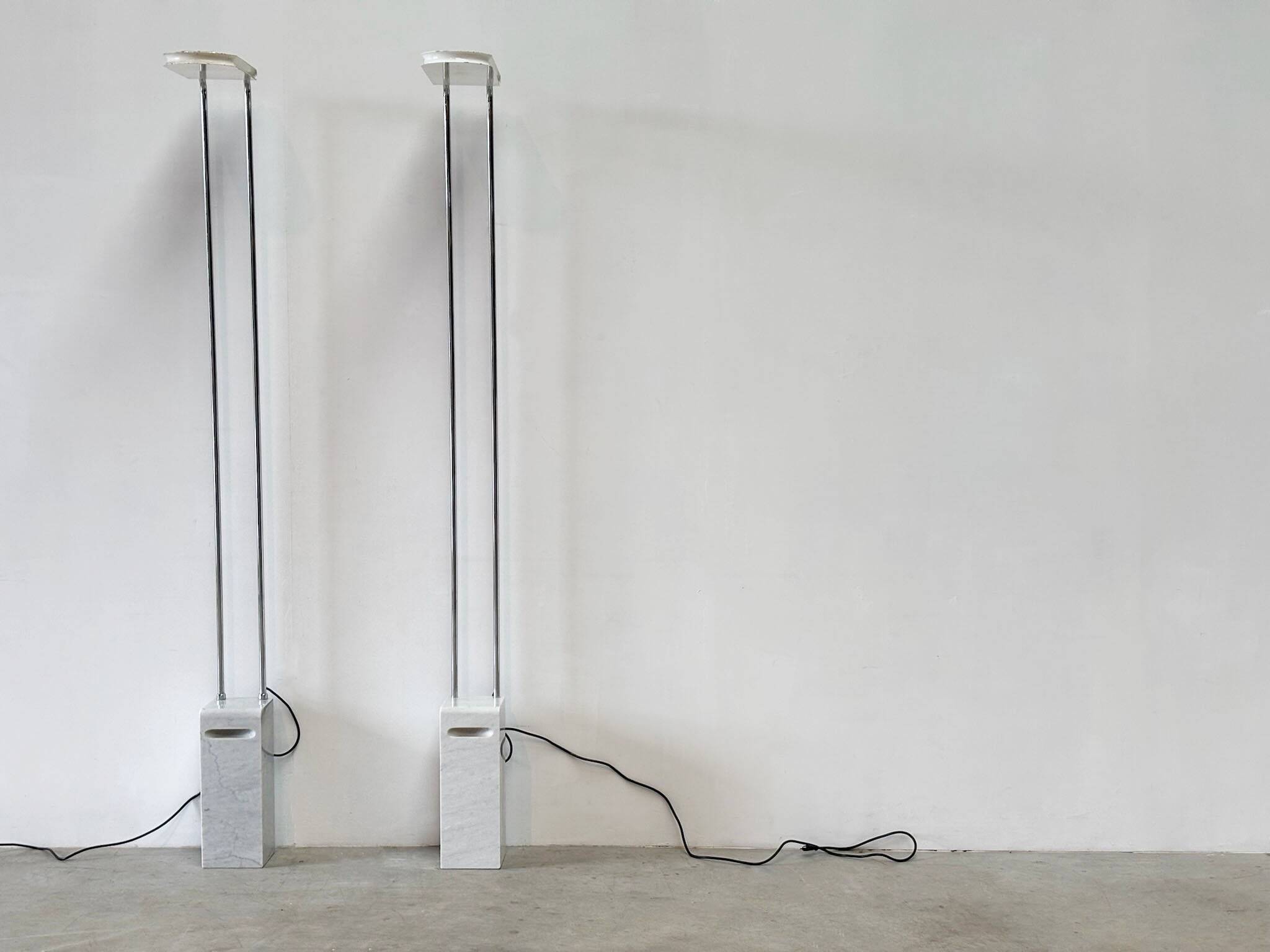 Pair of Skipper floor lamps by Bruno Gecchelin