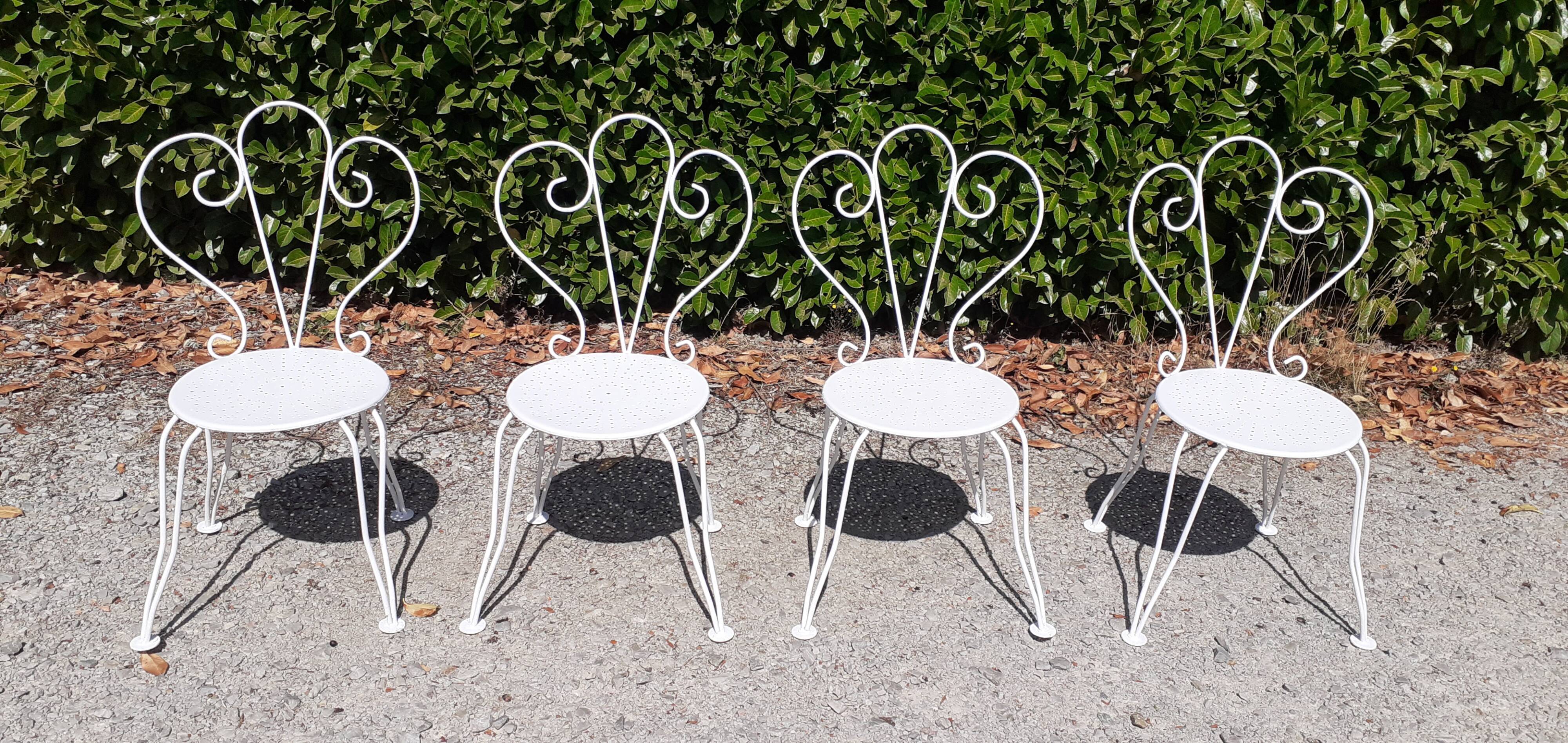 Old white wrought iron garden set