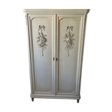 Armoire 2 portes peinte aux attributs