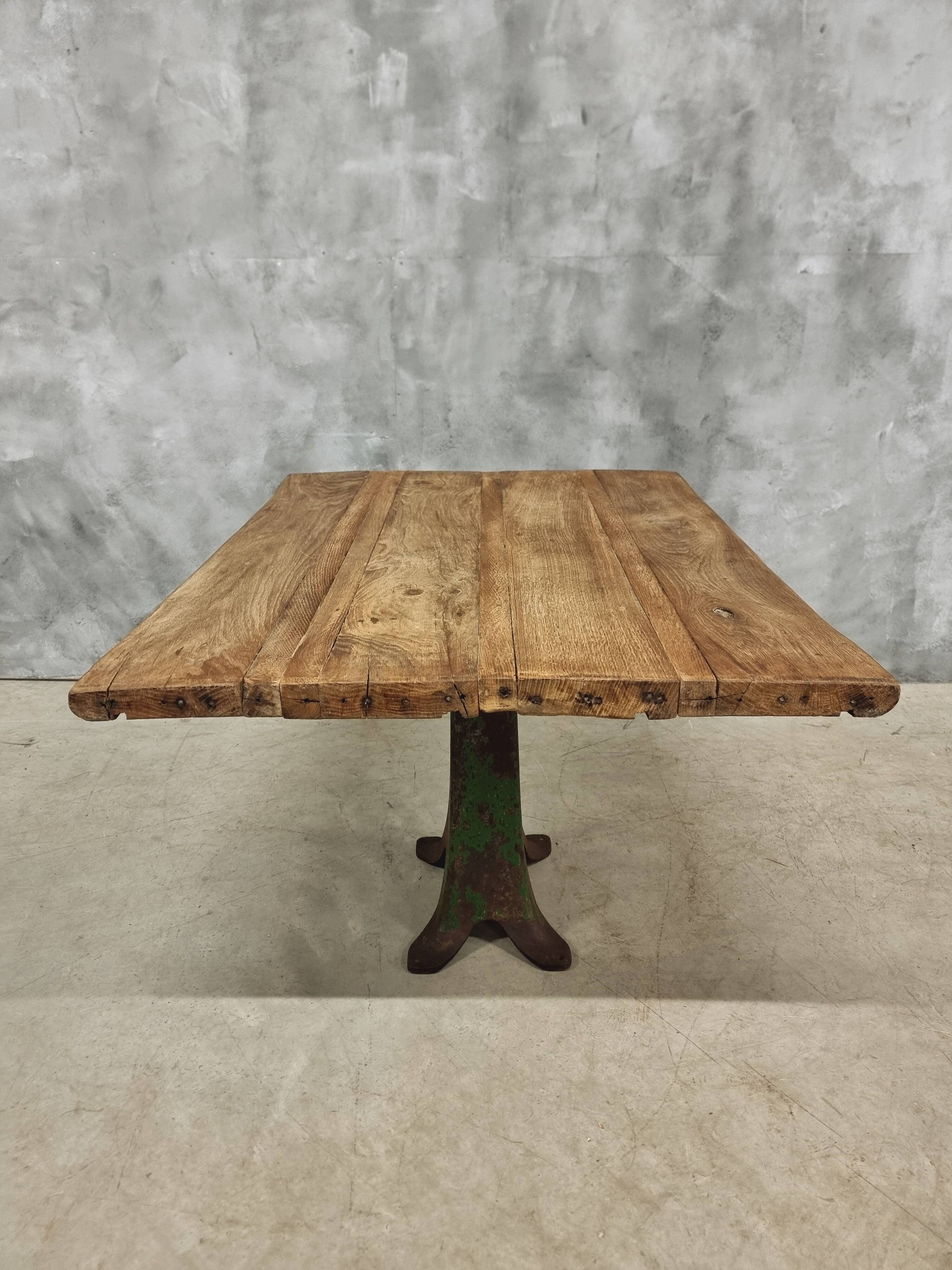 Antique oak dining table on cast iron base 93 x 123 cm