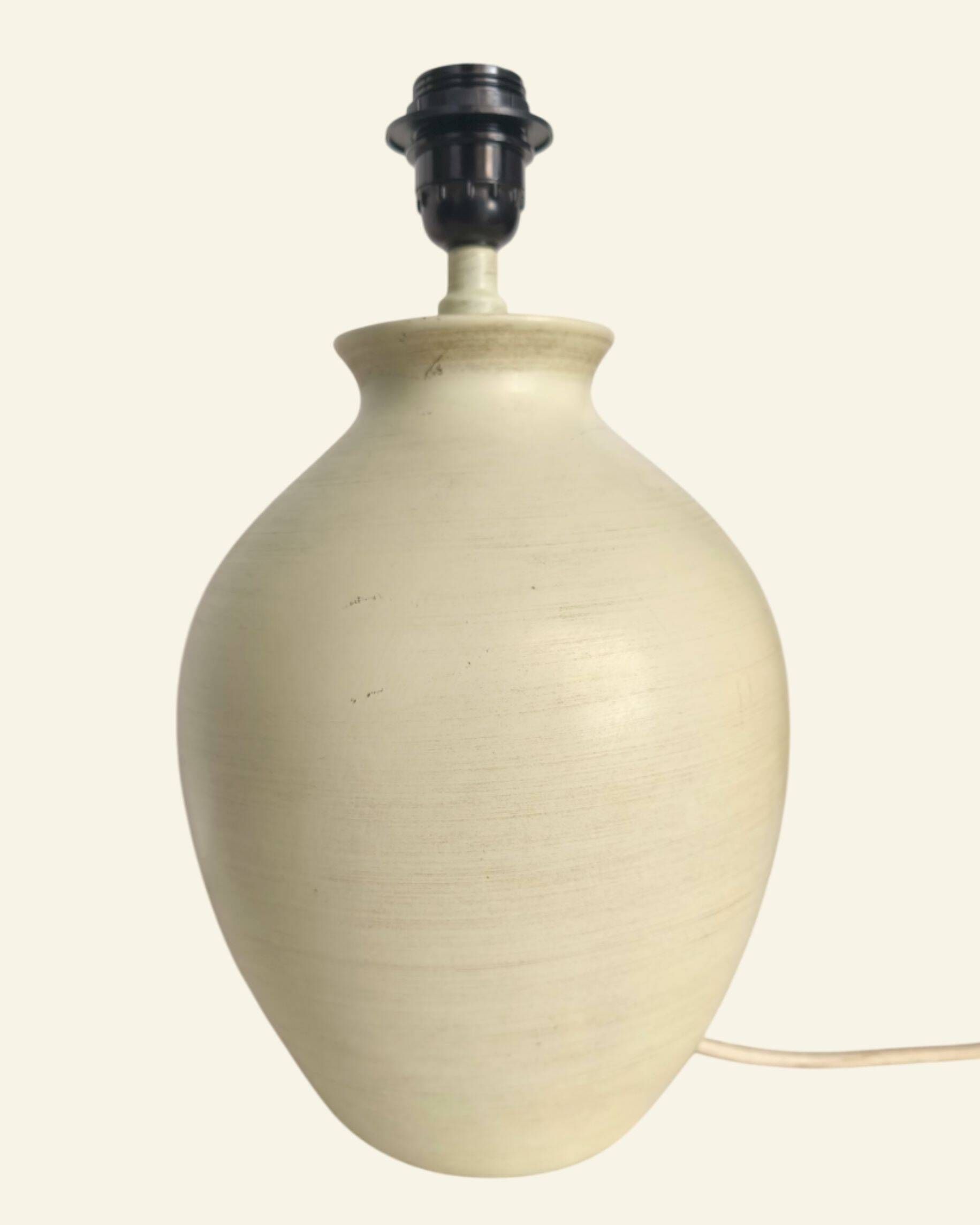 Ceramic lamp base turned in sand colour, organic shape.