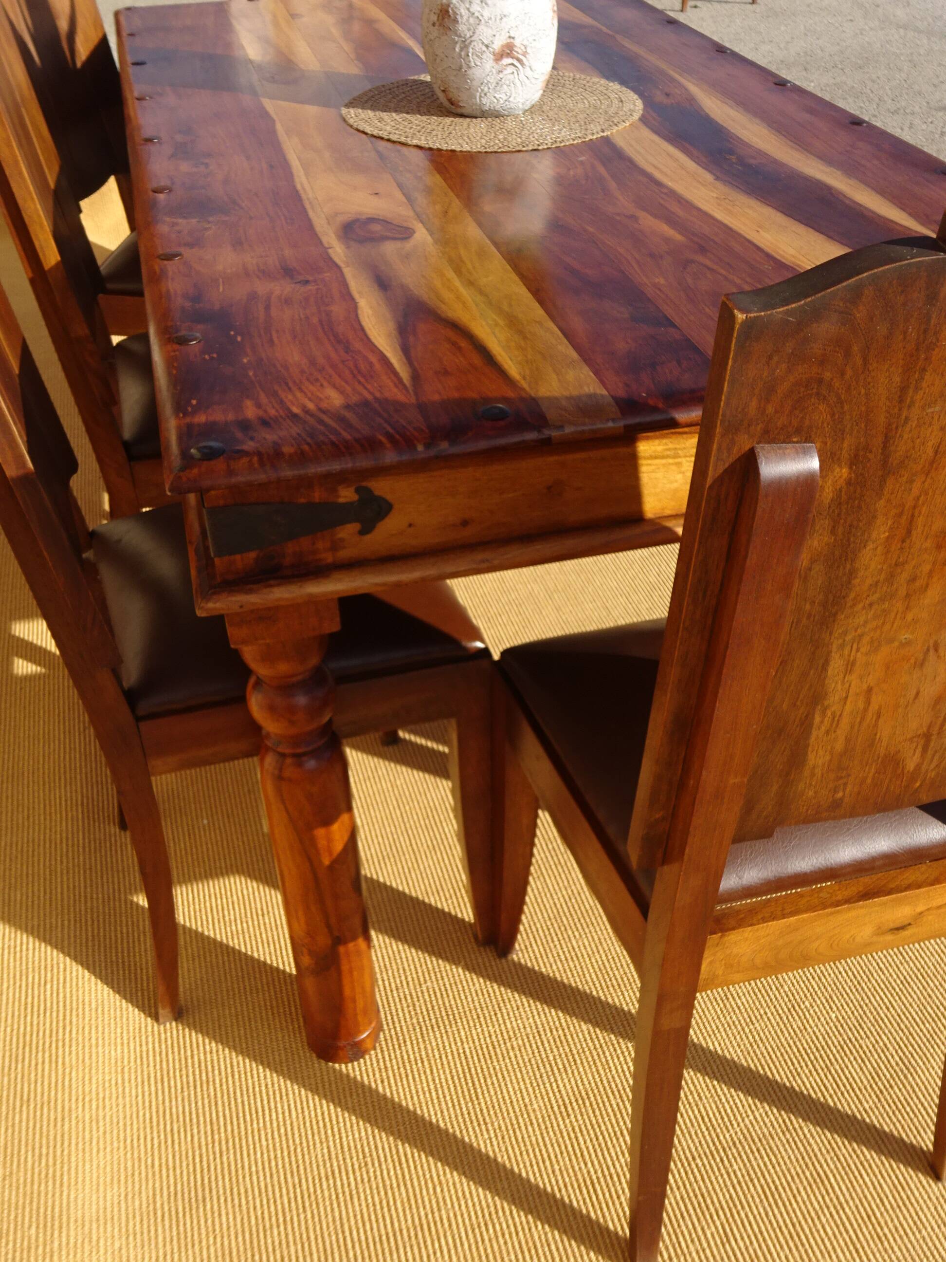 Solid wood and wrought iron table