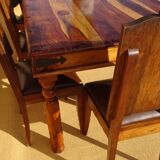 Solid wood and wrought iron table