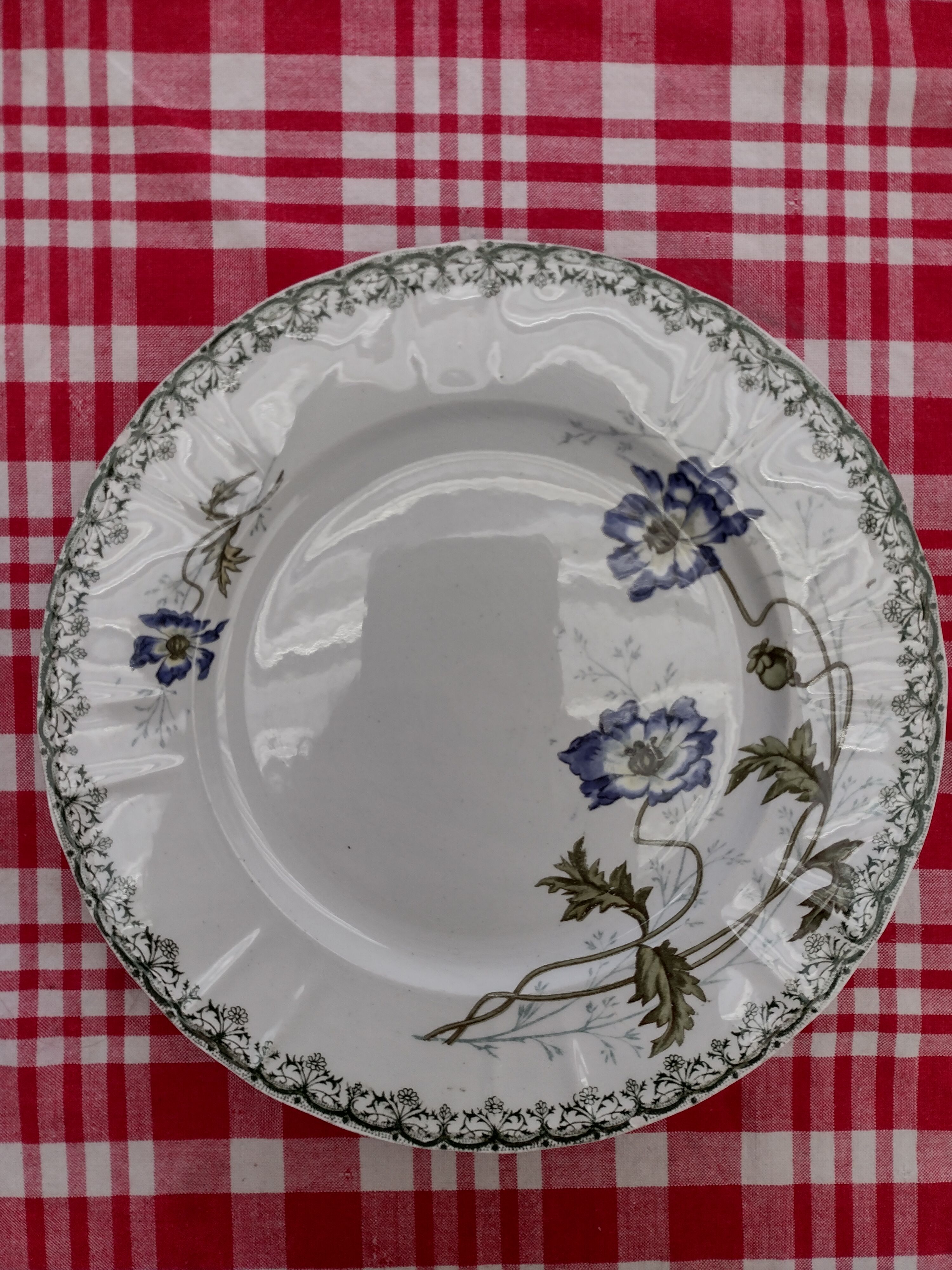 4 matching plates iron earth 1900
