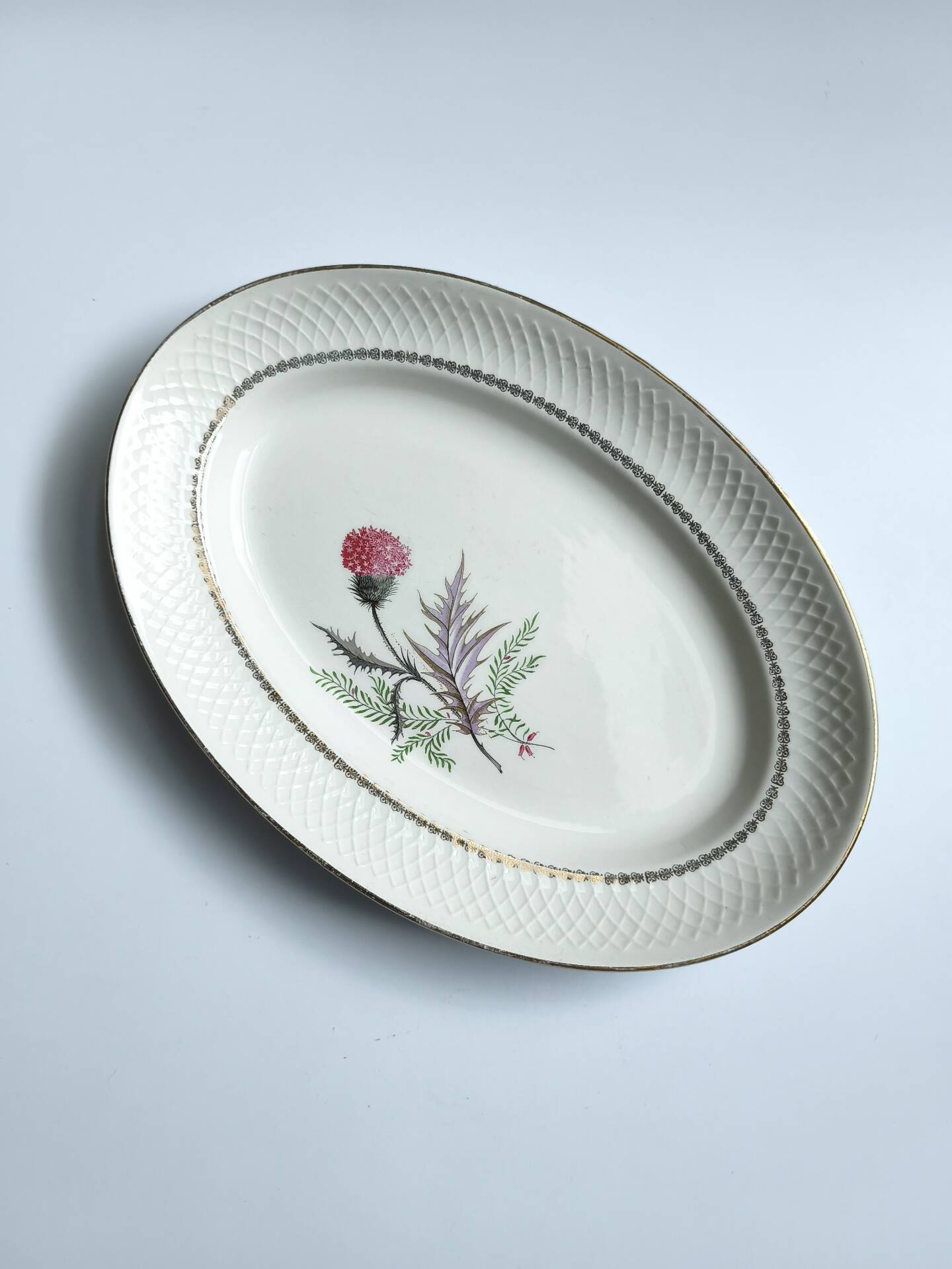 Vintage oval plate signed Moulin des Loups model Imperia pink flower