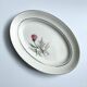 Vintage oval plate signed Moulin des Loups model Imperia pink flower