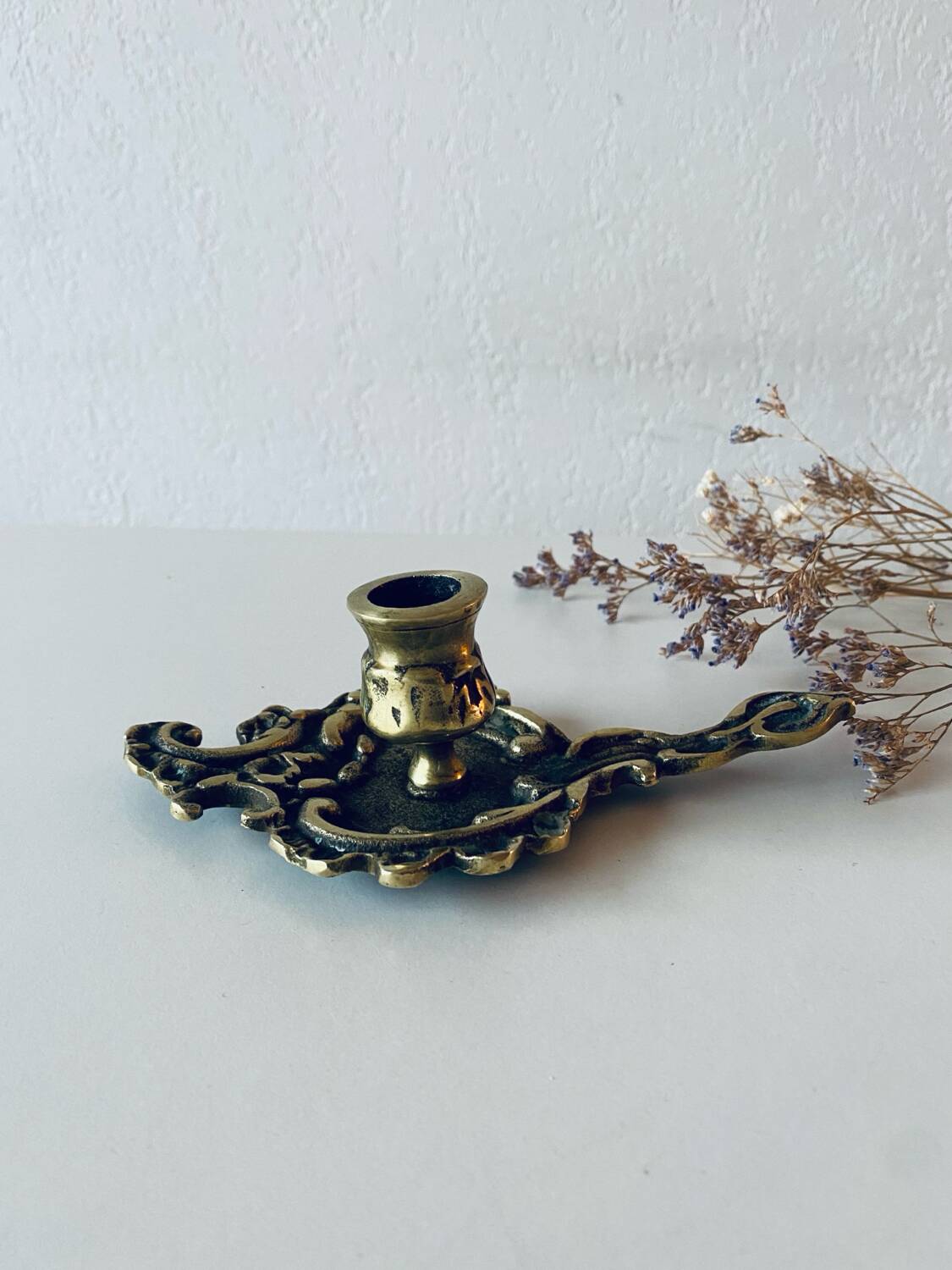 Antique bronze candle holder