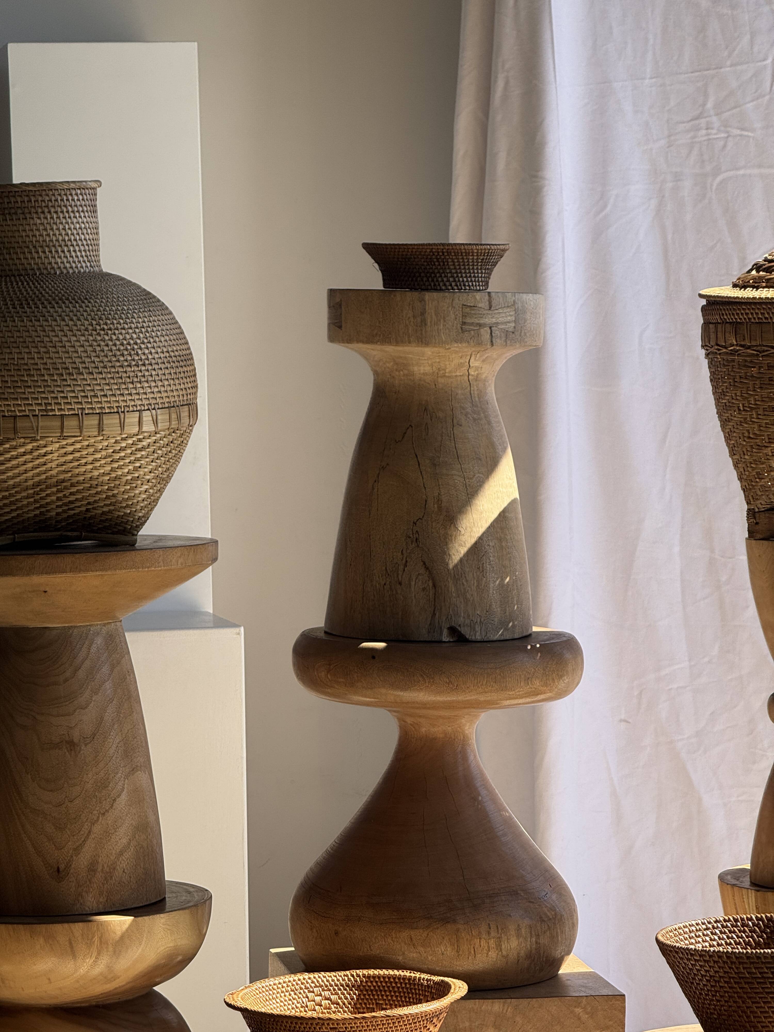 Natural solid mango side table (monoxyle) with conical legs.