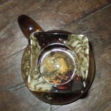 Speckled decanter with three spouts