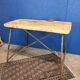 Vintage workbench circa 1930, folding metal leg.