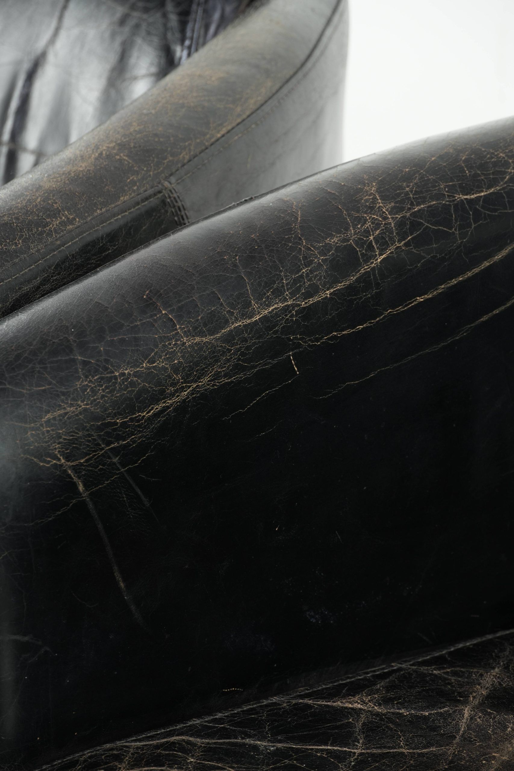 Set of two black vintage cowhide aviator design armchairs