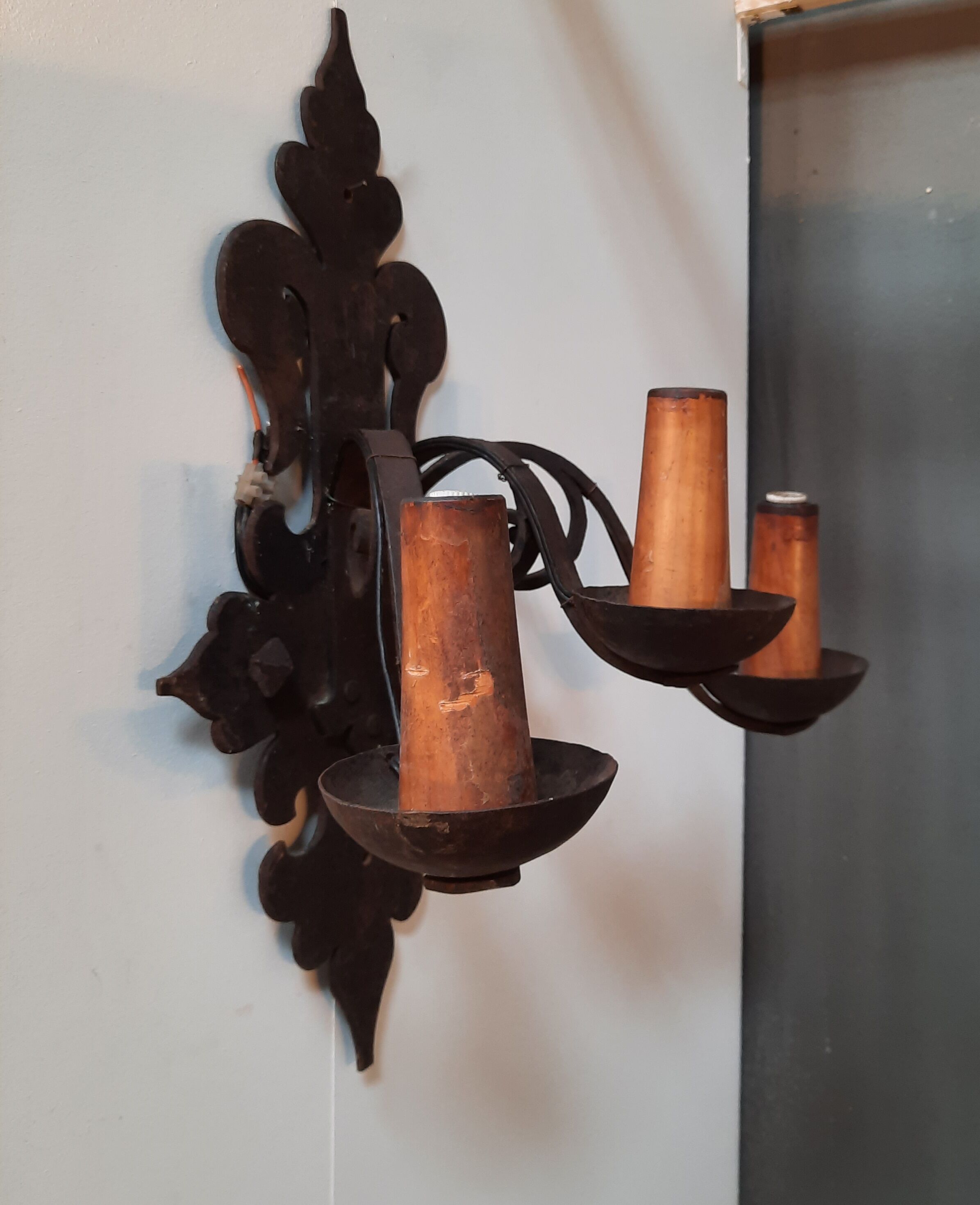 2 medieval-style wrought iron sconces
