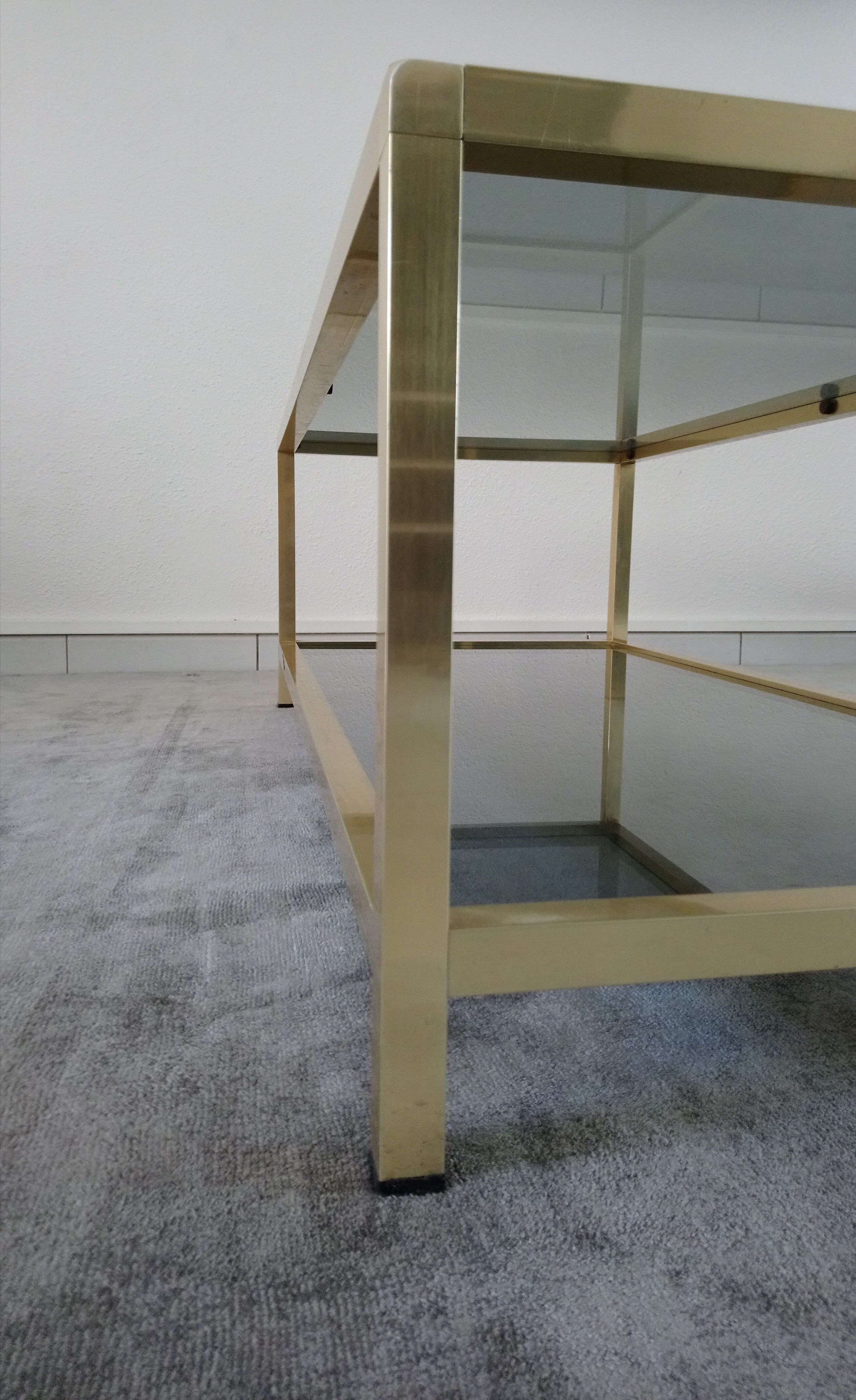 Table low brass and smoked glass 70s