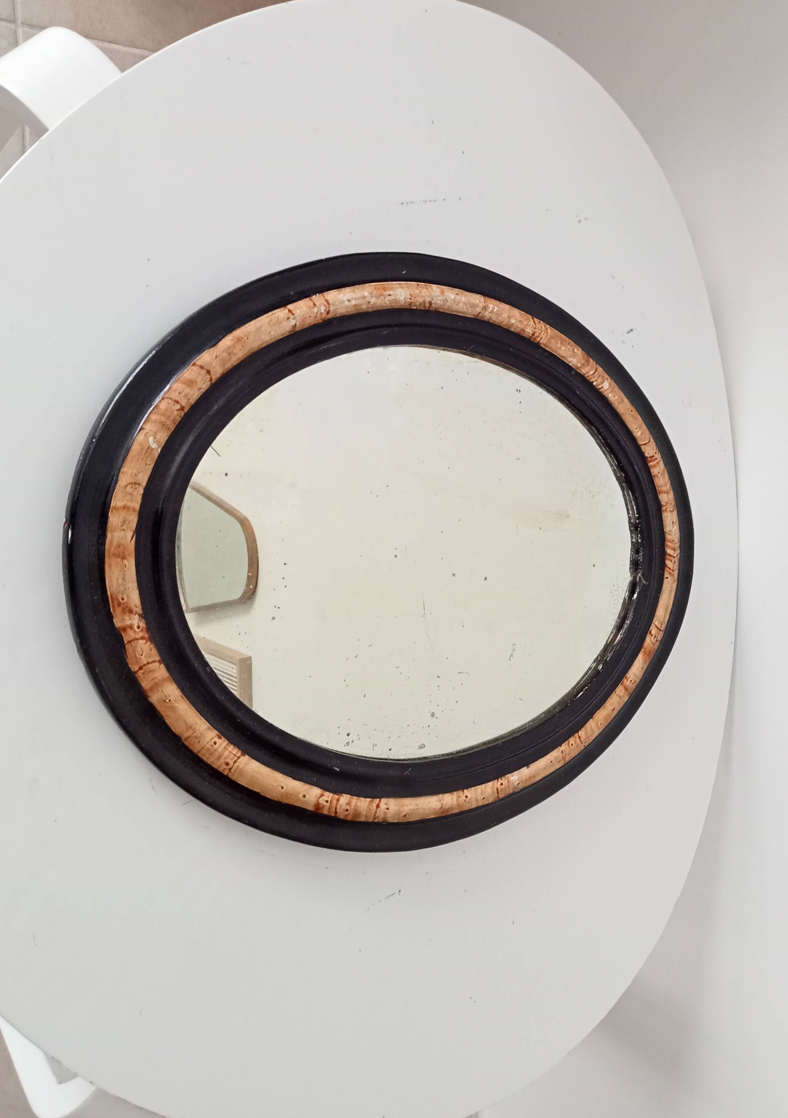 19th-century antique mirror in wood and stucco.