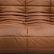 Three-seater Togo sofa in dark cognac leather by Michel Ducaroy for Ligne Roset.