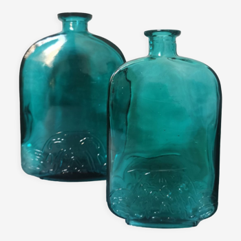 Blue engraved glass bottles