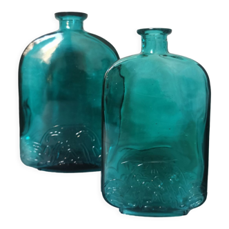 Blue engraved glass bottles