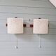 Pair of Scandinavian wall sconces in teak and plastic resin, 1960.