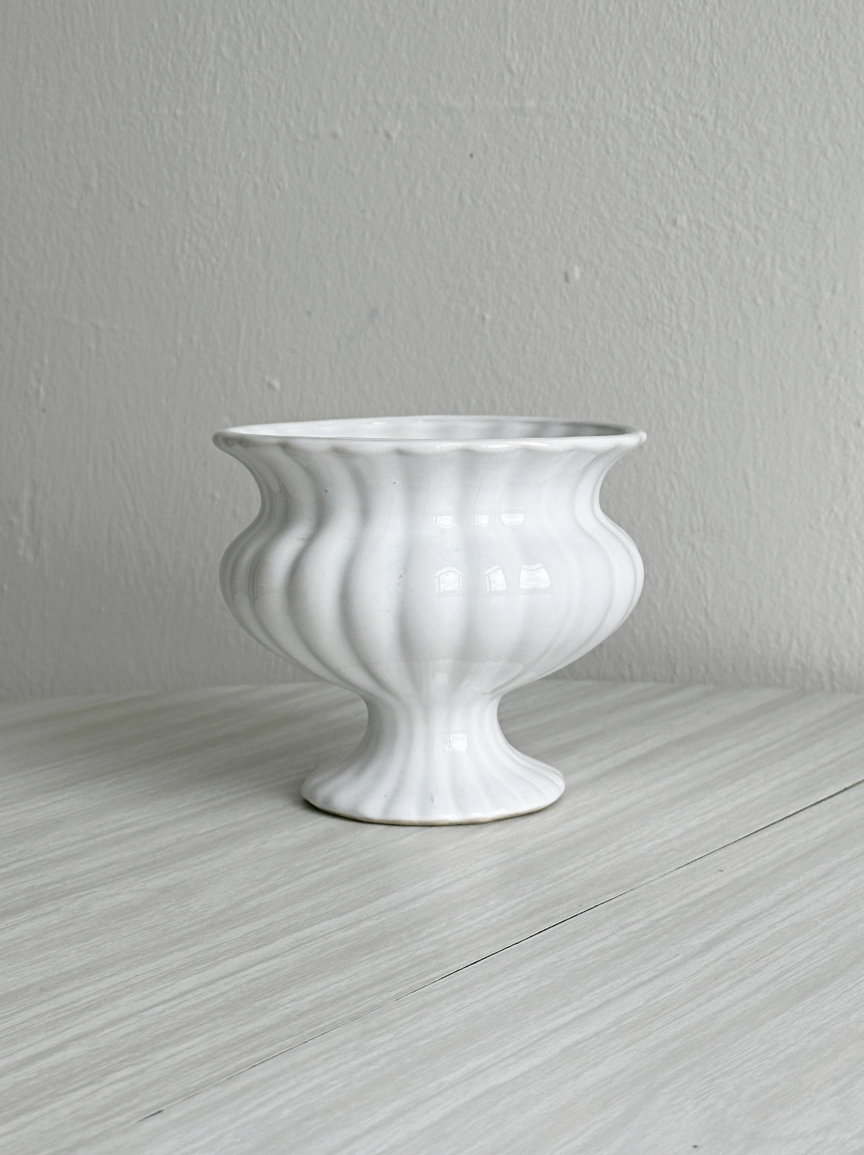 White ribbed porcelain plant pot cover