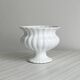 White ribbed porcelain plant pot cover