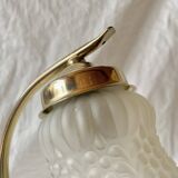 Old brass accent lamp in the shape of a flower