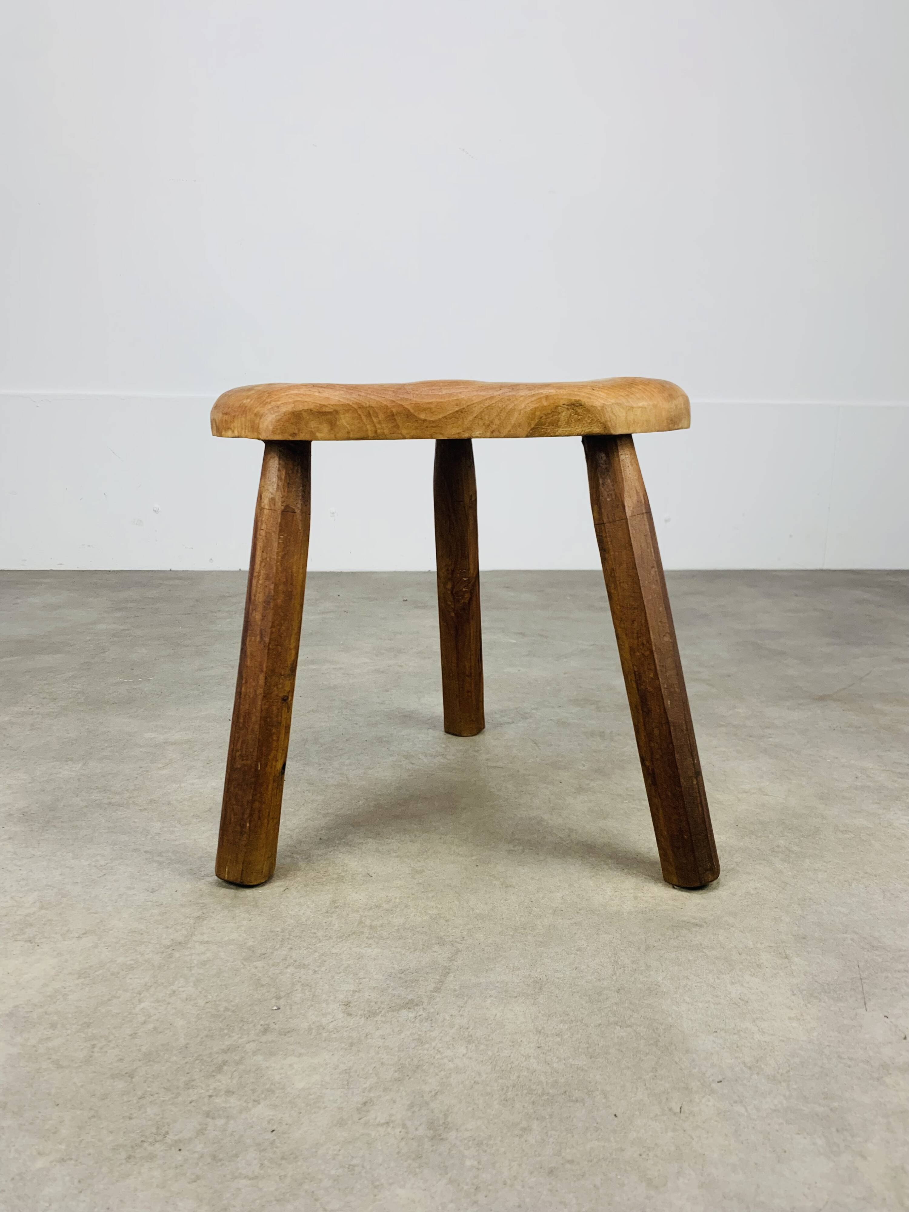 Brutalist tripod stool in solid wood
