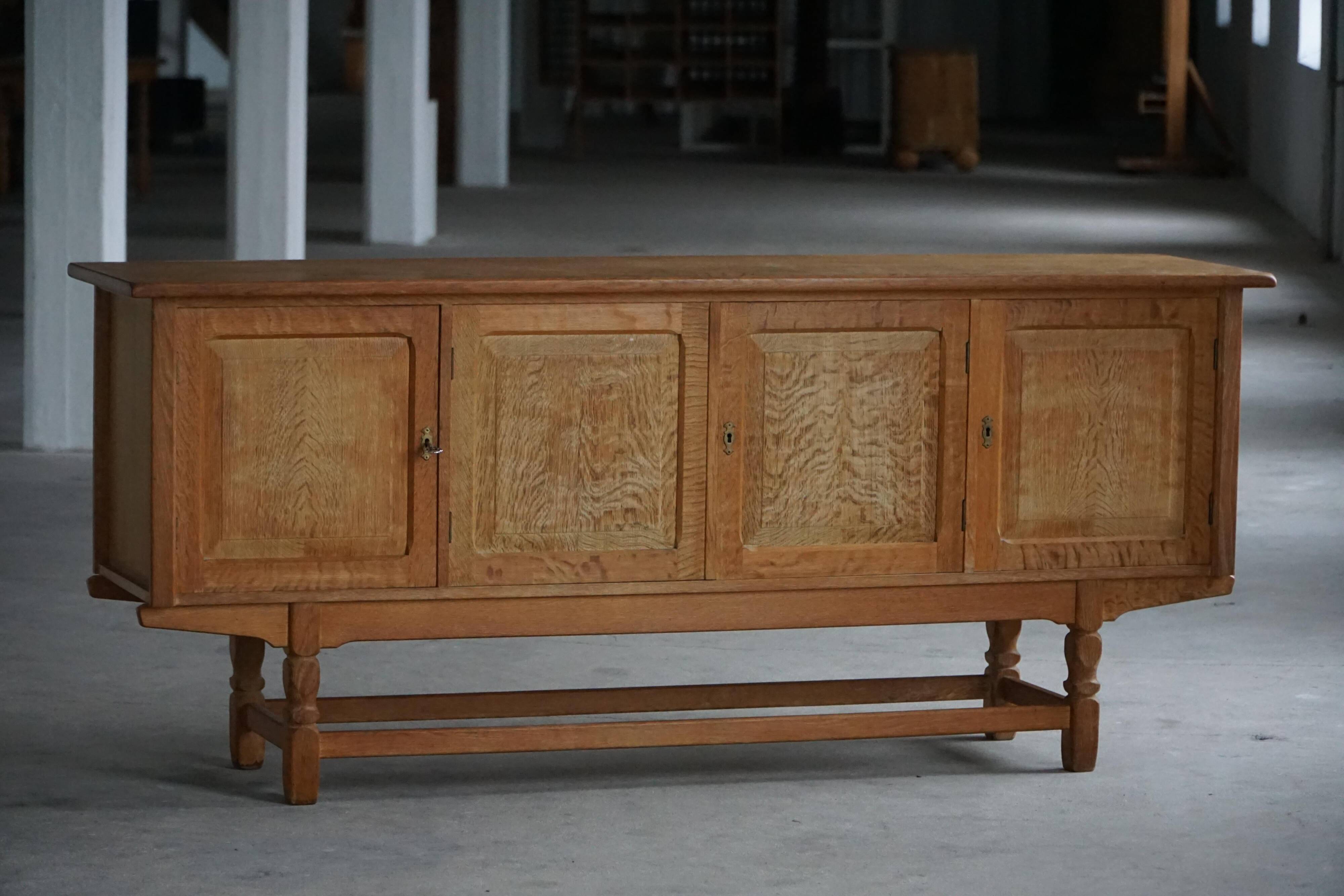 Low oak sideboard, mid-century modern, made by a Danish cabinetmaker, 1960s.