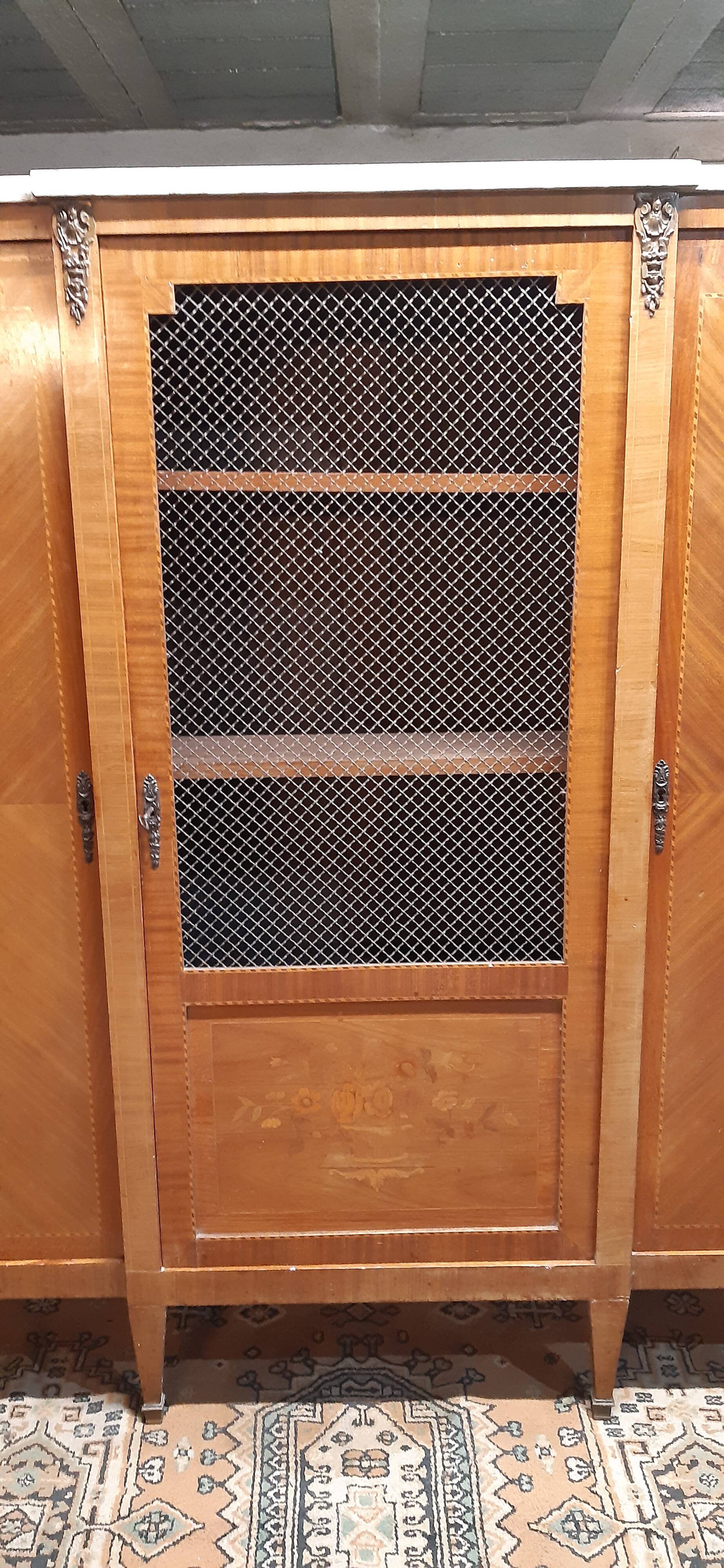 Louis XVI library with marble and precious wood marquetry circa 1850.