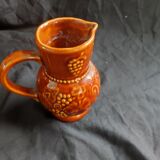 Glazed clay pitcher