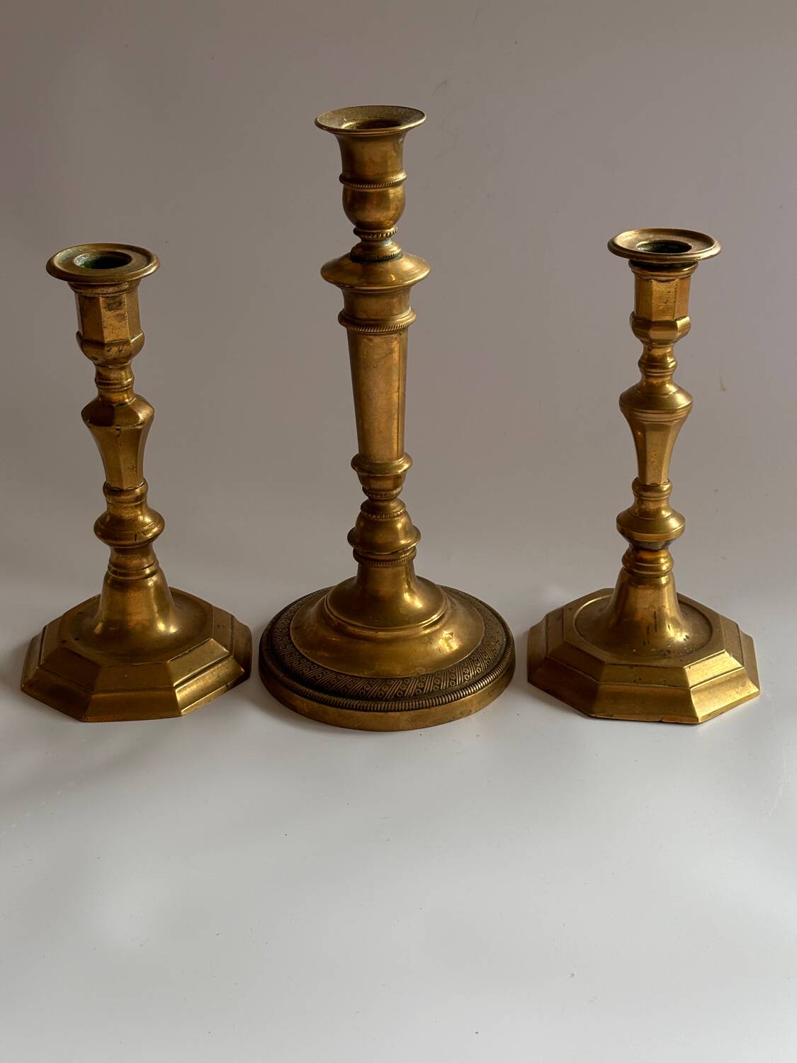 Set of 3 bronze and brass candlesticks, 19th century