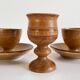 Trio of vintage ceramic and wood egg cups