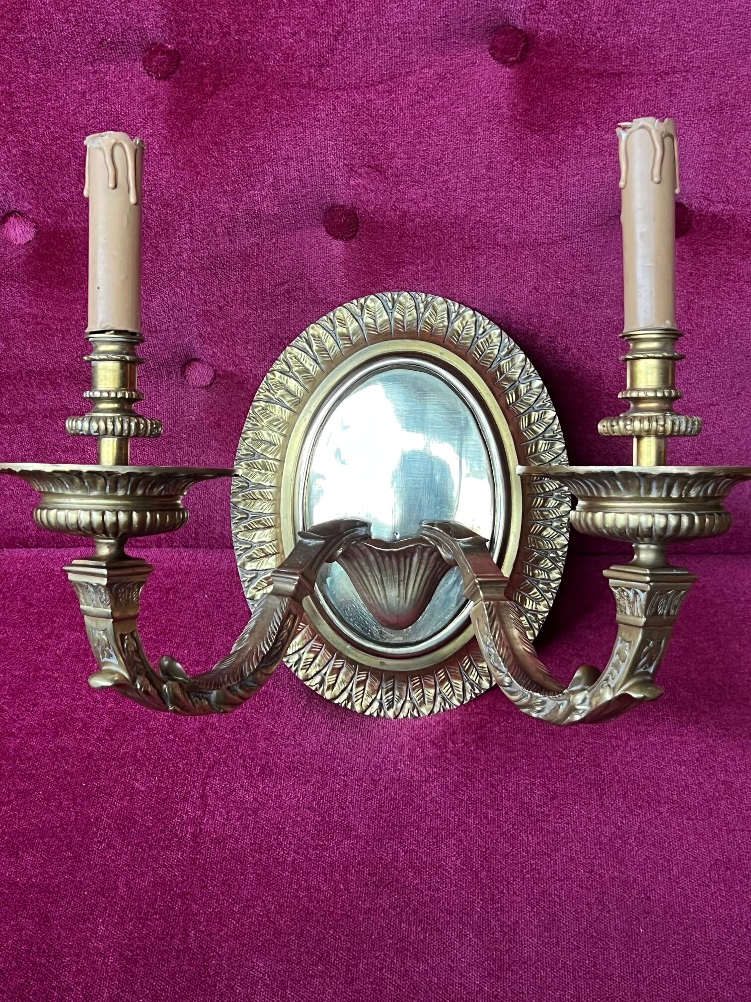 Pair of Louis XVI style solid gilded bronze wall sconces.
