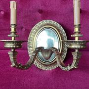 Pair of Louis XVI style solid gilded bronze wall sconces.
