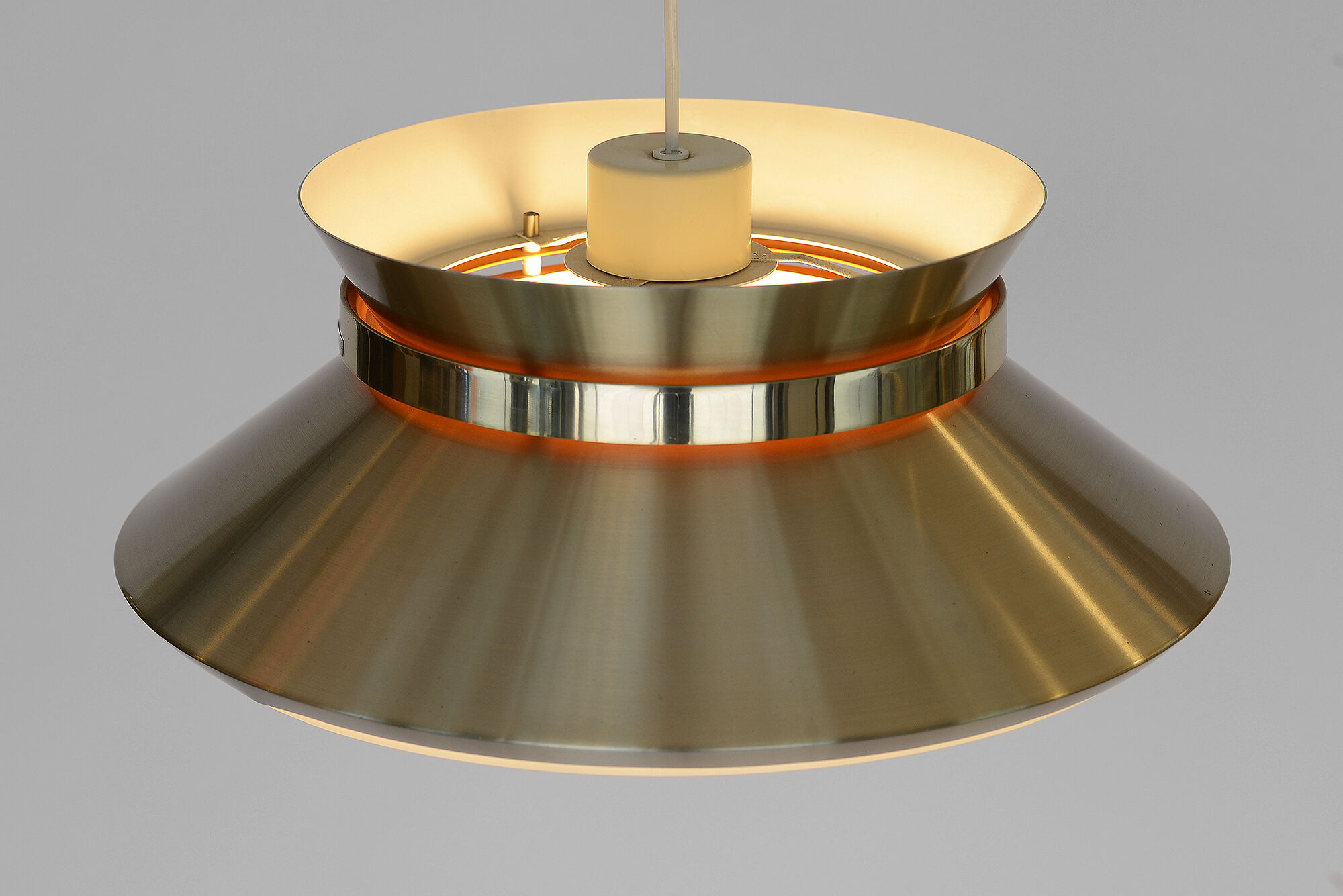 Brass colored aluminium pendant light by Carl Thore for Granhaga Metall. Sweden 1970s.