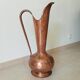 Old italian amphora vase in hammered copper
