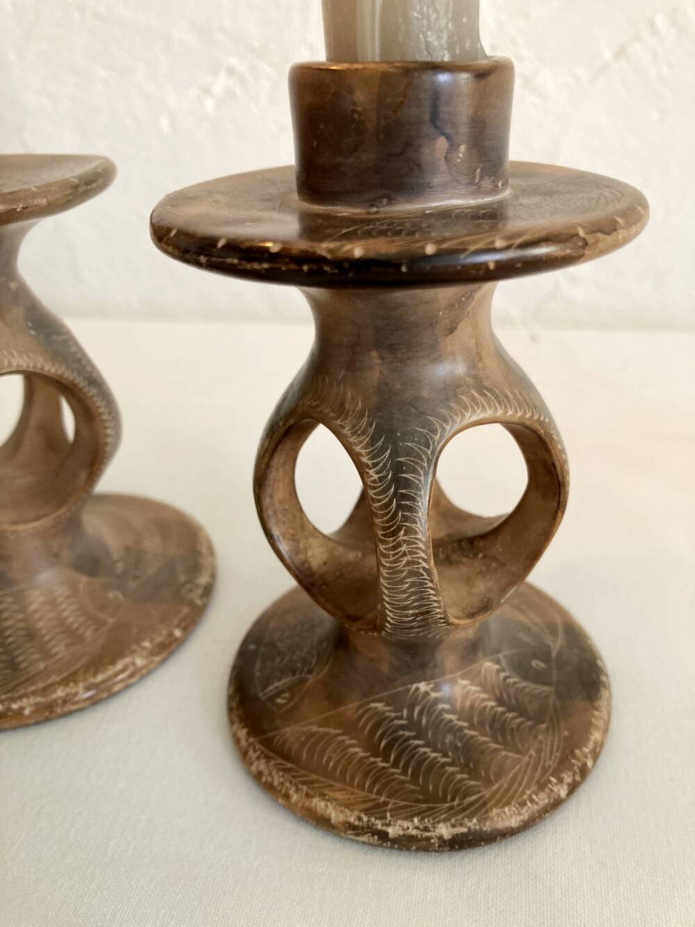 Pair of soapstone candlesticks, Kenya