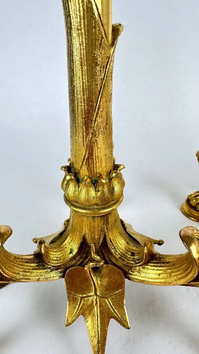 Pair of candelabra with a crane in gilded bronze, bamboo model.