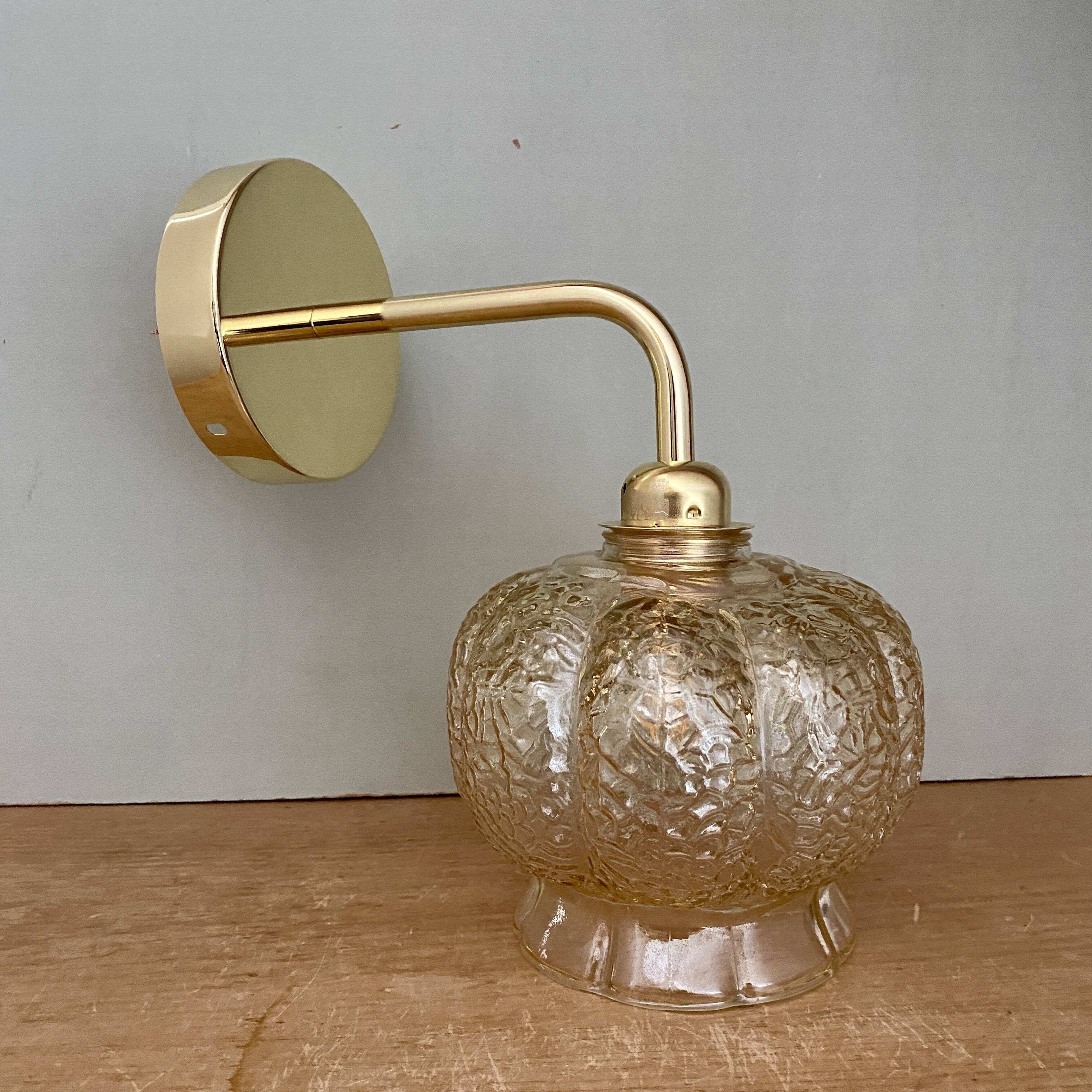 Vintage golden globe angled wall light in amber glass