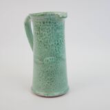 Large green ceramic pitcher with leopard enamel