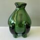 Amazing pitcher; vintage tripod jug or carafe in blown and hot-worked green glass