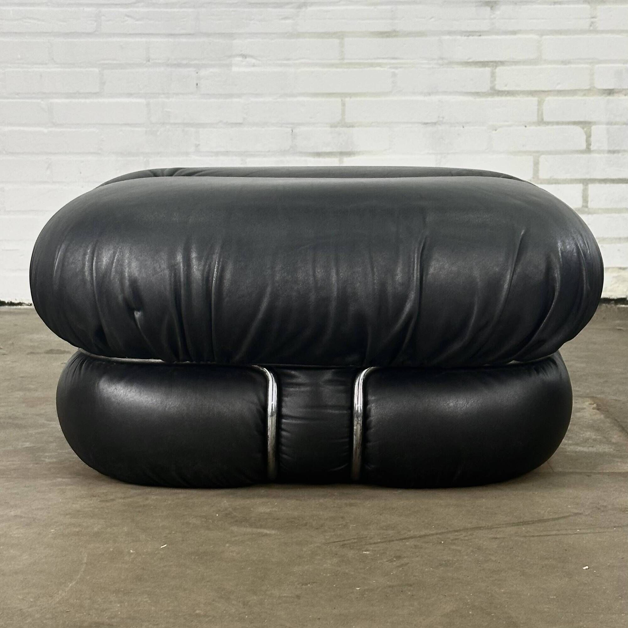 Okay armchair by Adriano Piazzesi in black leather with ottoman