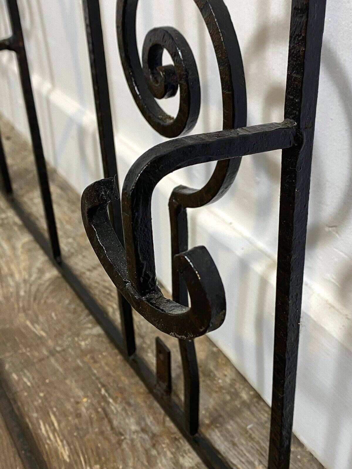 Wall-mounted coat rack in wrought iron, early 20th century