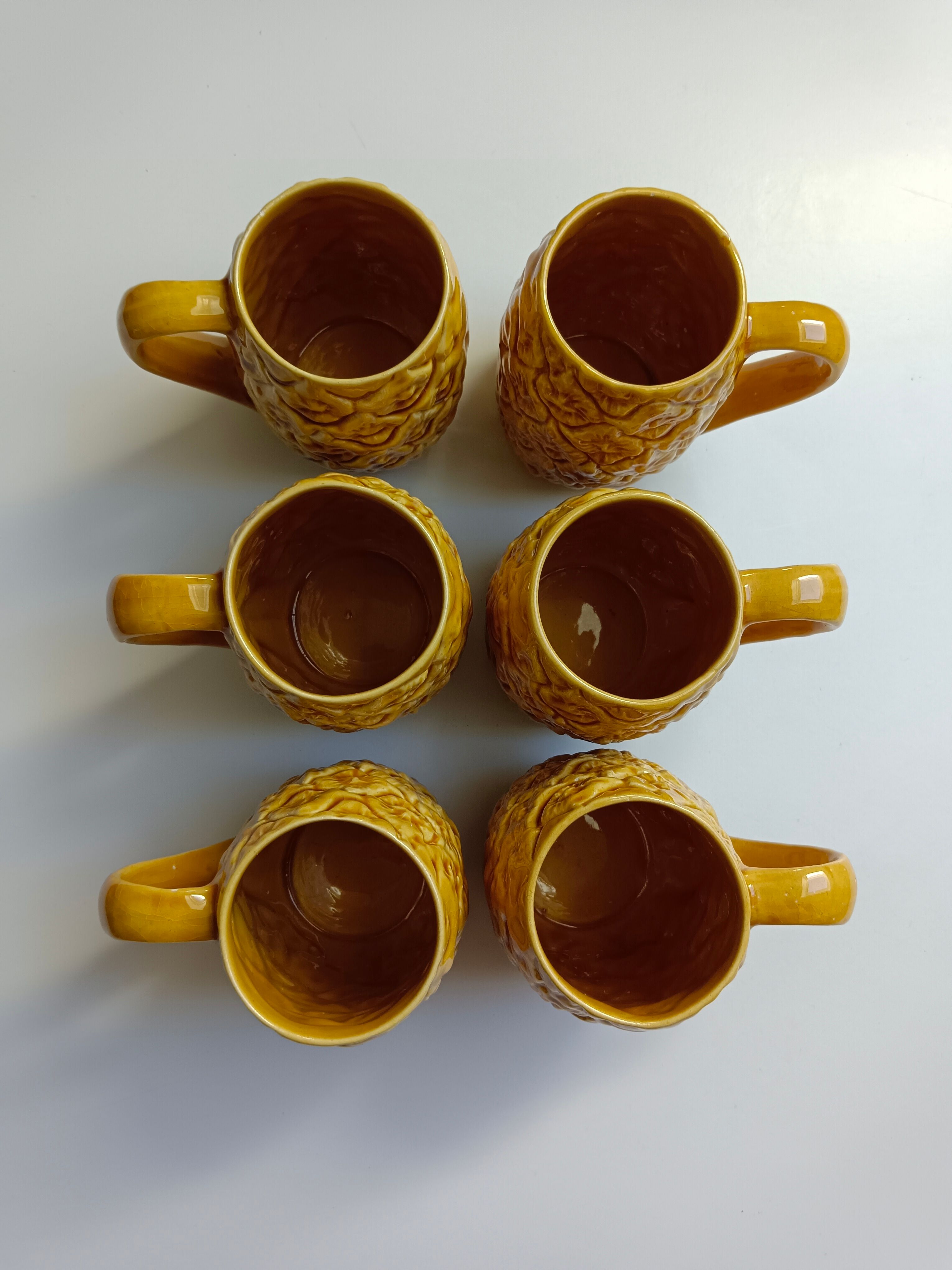 Handmade yellow pineapple mugs signed Kerangol made in Portugal.